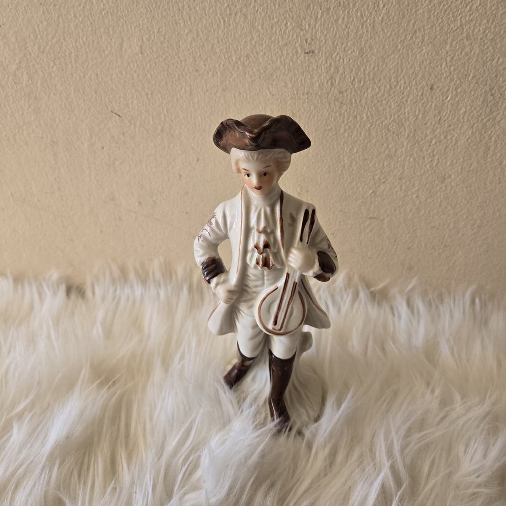 Vintage Colonial  Figurine in Brown and White Musician Young Man
